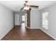 Spacious bedroom with a ceiling fan and natural light at 2466 Candlewick St, Deltona, FL 32738