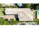 A captivating aerial view that reveals the home's meticulously designed roof and lush surroundings at 2542 S Peninsula Dr, Daytona Beach, FL 32118