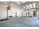 Spacious garage with high ceilings, a basketball hoop, and ample room for storage and vehicles at 2542 S Peninsula Dr, Daytona Beach, FL 32118