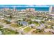 A beautiful aerial view captures a neighborhood near a beach with stunning ocean views and surrounding city buildings at 2565 S Peninsula Dr, Daytona Beach, FL 32118