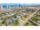 Aerial view showcasing property and neighborhood near the ocean and buildings at 2565 S Peninsula Dr, Daytona Beach, FL 32118