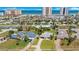 Aerial view showcasing property and neighborhood near the ocean and buildings at 2565 S Peninsula Dr, Daytona Beach, FL 32118
