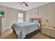 Bright bedroom with comfortable bedding, window, and pleasant decor for a relaxing space at 261 Clydesdale Cir, Sanford, FL 32773
