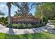 Brick sign for Baker's Crossing community surrounded by landscaped greenery at 261 Clydesdale Cir, Sanford, FL 32773