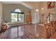 Open-concept living and dining area featuring hardwood floors and natural light at 261 Clydesdale Cir, Sanford, FL 32773