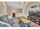 Spacious living room with couches, coffee table, large screen tv and nice decor at 261 Clydesdale Cir, Sanford, FL 32773