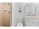 Bathroom showcasing a walk-in shower, neutral tiles, and contemporary fixtures with optimal convenience at 2626 S Atlantic Ave # 1080, Daytona Beach, FL 32118
