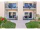 Dual patios with outdoor seating and sliding doors offers great views of the community pool at 2626 S Atlantic Ave # 1080, Daytona Beach, FL 32118