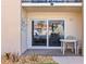 Private patio with sliding glass door and outdoor seating with a pool view at 2626 S Atlantic Ave # 1080, Daytona Beach, FL 32118