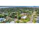 Neighborhood aerial shot with mature trees, colorful homes, and coastal city views at 263 Seaview Ave, Daytona Beach, FL 32118