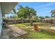 Spacious backyard with mature trees, and a wooden fence at 263 Seaview Ave, Daytona Beach, FL 32118