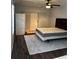 Bedroom with dark wood floors, area rug and bed with box spring at 263 Seaview Ave, Daytona Beach, FL 32118