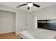 Bright bedroom featuring a ceiling fan, closet, and light-colored walls and floor at 263 Seaview Ave, Daytona Beach, FL 32118