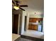 Cozy kitchen featuring tile floors, wooden cabinets, and modern white appliances at 263 Seaview Ave, Daytona Beach, FL 32118