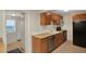 Cozy kitchen featuring ample cabinet space, stainless steel appliances, and tile flooring at 263 Seaview Ave, Daytona Beach, FL 32118