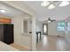 Open-concept living space featuring neutral tones, tile flooring, and good natural light at 263 Seaview Ave, Daytona Beach, FL 32118