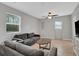 Spacious living area with comfortable seating, neutral decor, and natural light from multiple windows at 263 Seaview Ave, Daytona Beach, FL 32118