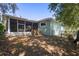 The backyard has a screened patio, a fenced yard, and a lake view to give you the privacy you need at 2635 Wood Duck Vlg, Deland, FL 32720