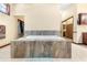 Bathroom with large marble-tiled tub and private access to closet space at 2635 Wood Duck Vlg, Deland, FL 32720