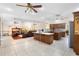 Open concept living space with kitchen, living and dining areas at 2635 Wood Duck Vlg, Deland, FL 32720