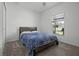 This bedroom offers neutral walls, soft carpet, and a cozy area to rest and unwind at 2743 Gentle Rain Dr, Davenport, FL 33837