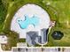 The uniquely shaped community pool boasts chairs, a playground, and a clubhouse at 2743 Gentle Rain Dr, Davenport, FL 33837