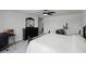 Spacious main bedroom with a ceiling fan, desk, and home workout equipment at 2743 Gentle Rain Dr, Davenport, FL 33837