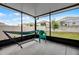 Covered patio provides an unobstructed view of the backyard and the surrounding neighborhood at 2743 Gentle Rain Dr, Davenport, FL 33837