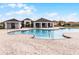 Bright community pool featuring ample deck space, multiple seating areas and a modern design at 2743 Gentle Rain Dr, Davenport, FL 33837