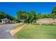 Street view showcasing the entrance to Halifax Plantation with signage and landscaping at 2901 Monaghan Dr, Ormond Beach, FL 32174