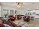 Open-concept layout with a living room and the adjacent modern kitchen, ideal for Gathering gatherings at 2901 Monaghan Dr, Ormond Beach, FL 32174