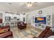 Open-concept living room seamlessly connects to the modern kitchen, creating a perfect space for entertaining at 2901 Monaghan Dr, Ormond Beach, FL 32174