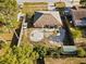 Aerial view of a fenced backyard with landscaping and a shed at 3109 Sky St, Deltona, FL 32738
