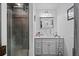 Bathroom with a glass enclosed shower, a sink, and vanity at 3109 Sky St, Deltona, FL 32738
