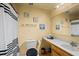 Bright bathroom featuring a vanity, framed mirror, and shower with a black and white striped curtain at 3109 Sky St, Deltona, FL 32738