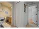 Hallway view of bathroom with toilet and sink at 3109 Sky St, Deltona, FL 32738