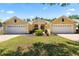 Well-maintained home with a two-car garage, lush lawn, and inviting curb appeal at 3140 Kailani Ct, Ormond Beach, FL 32174