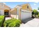 Attractive property showcasing manicured landscaping and a two-car garage at 3140 Kailani Ct, Ormond Beach, FL 32174