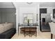Charming dining area with modern table set and stainless steel refrigerator in view at 320 Conch Key Way, Sanford, FL 32771