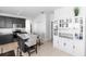 Spacious kitchen features a stylish island with bar seating, granite counters, and a dining nook at 320 Conch Key Way, Sanford, FL 32771