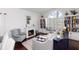 Cozy living room featuring a fireplace, comfortable furniture, and built in bookshelves at 320 Conch Key Way, Sanford, FL 32771