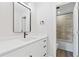 Clean bathroom includes white vanity, black fixtures, and tiled shower/tub combo in separate room at 3333 Atmore Ter, Ocoee, FL 34761