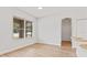Light-filled dining area with wood-look floors and a view of the backyard at 3333 Atmore Ter, Ocoee, FL 34761