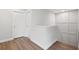 Hallway with white walls, white trim, and vinyl flooring at 3333 Atmore Ter, Ocoee, FL 34761