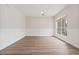 Bright living room with nice vinyl floors and chair rail at 3333 Atmore Ter, Ocoee, FL 34761