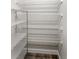 Walk-in closet with adjustable wire shelving, providing ample storage space at 3470 Tesoro Cir, New Smyrna Beach, FL 32168