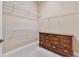This walk-in closet offers ample storage space with multiple wire shelves and a built-in dresser at 3470 Tesoro Cir, New Smyrna Beach, FL 32168
