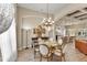 Cozy dining room featuring an elegant chandelier and neutral decor at 3470 Tesoro Cir, New Smyrna Beach, FL 32168