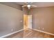 This bedroom features modern flooring and access to a Primary bath at 38 Lake Walden Trl, Ormond Beach, FL 32174