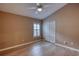 This bedroom features modern flooring, natural light and a closet at 38 Lake Walden Trl, Ormond Beach, FL 32174